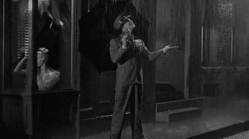 singing in the rain pluie movie film video black and white gif 